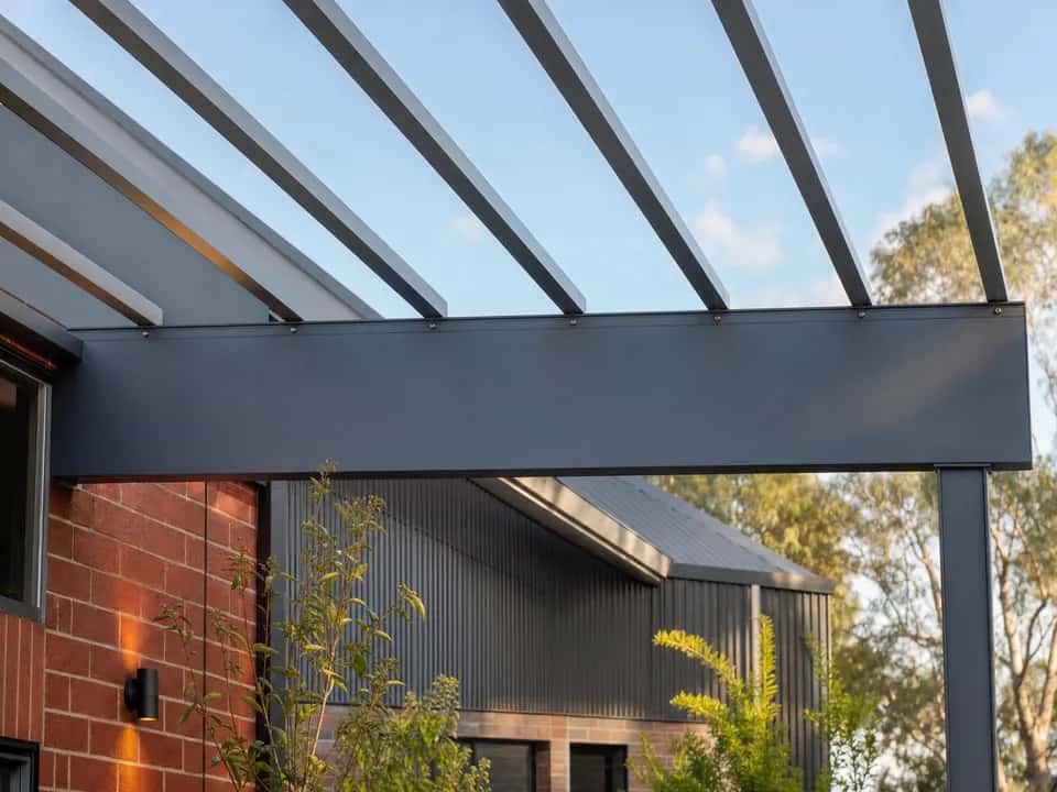 Pergola roof battens fixed on top of the charcoal main beam