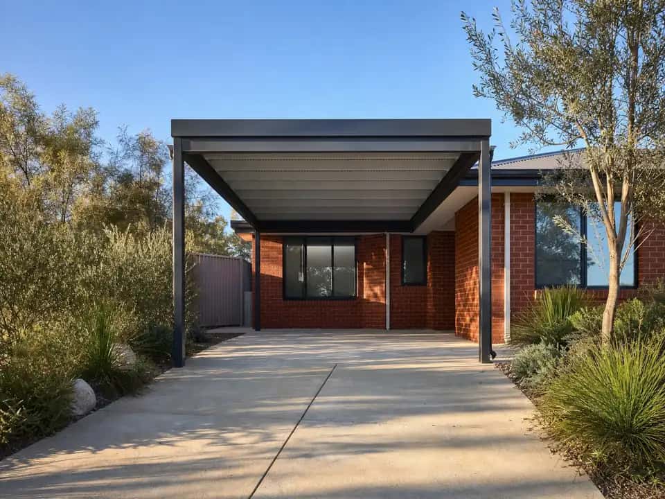 Carport frame and roof matched to the house gutters and trims
