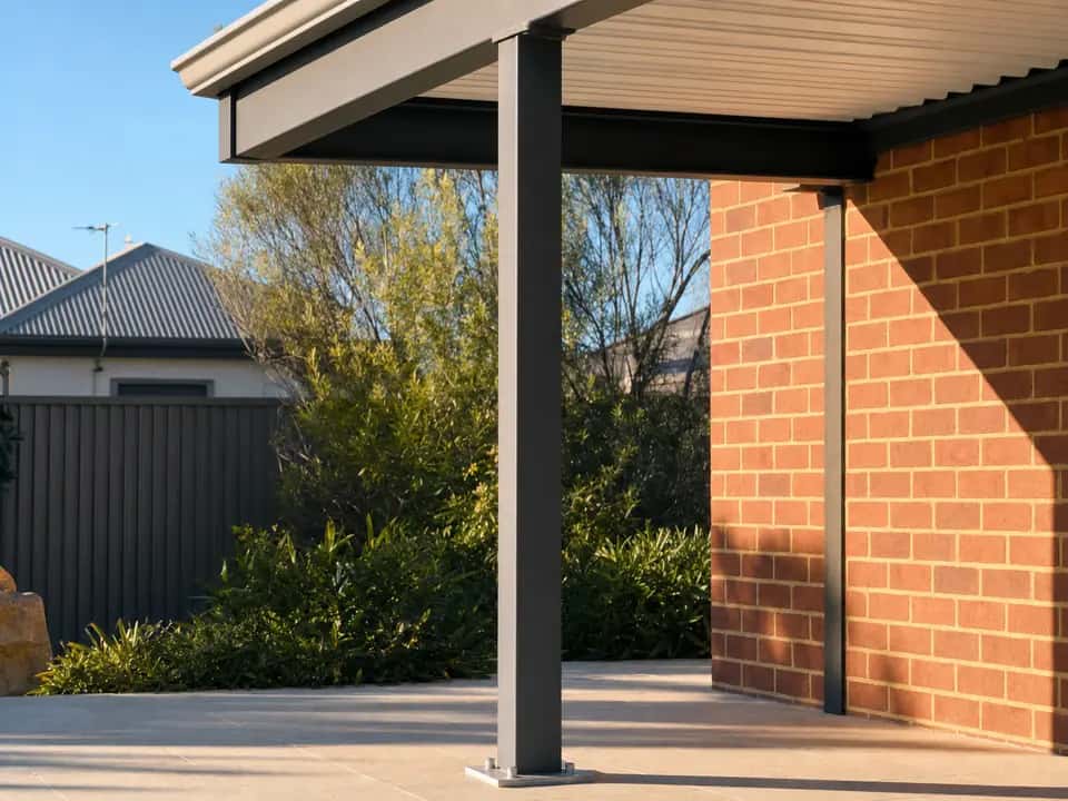 Steel patio post on a base plate supporting the beam