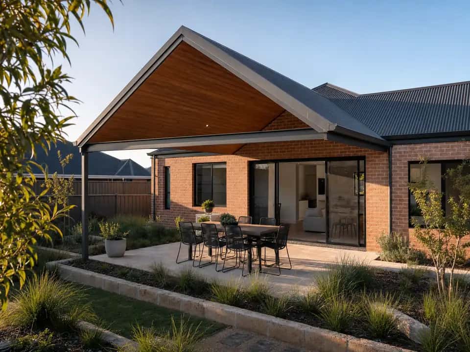 Wide gable patio with a long beam spanning between two posts