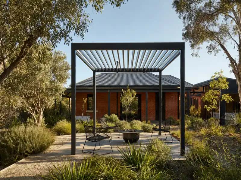 Freestanding pergola over paving in the garden